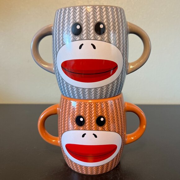 Pair of Retro Knitted Sock Monkey Ceramic Dual Handled Dual-Sided Mugs - GALERIE - Picture 1 of 9